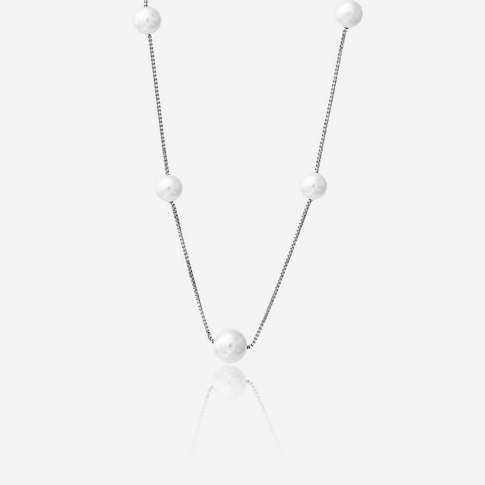 Pearl necklace on a white background