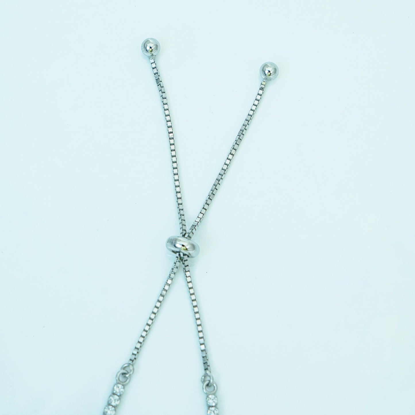 Effortless Sparkle: Sterling Silver Rhodium-Plated Adjustable Tennis Bracelet