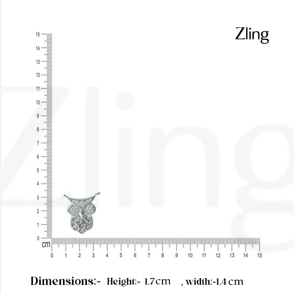 Small owl pendant with a ruler for scale on a white background, branded 'Zling'.