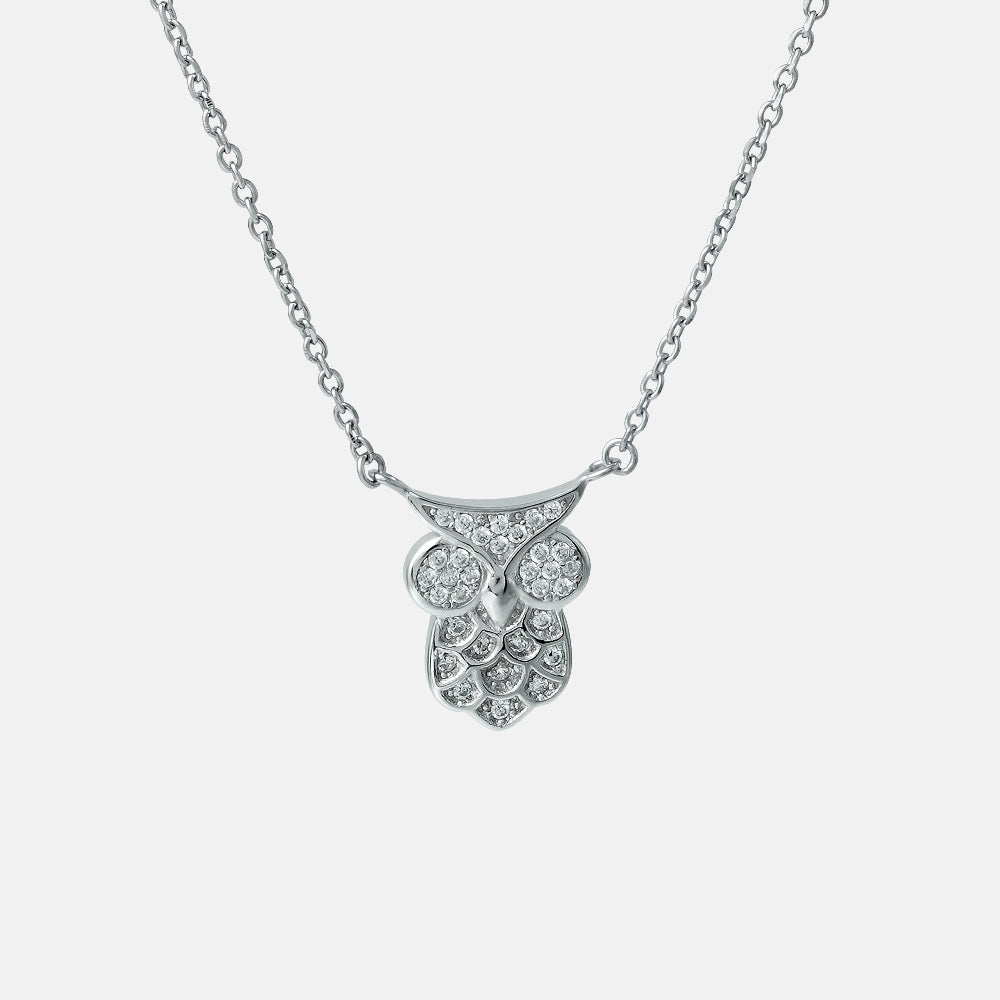 Silver necklace with a leaf-shaped pendant on a light gray background