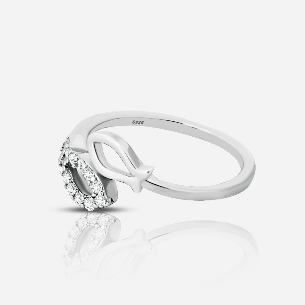 Silver ring with a heart-shaped design on a white background