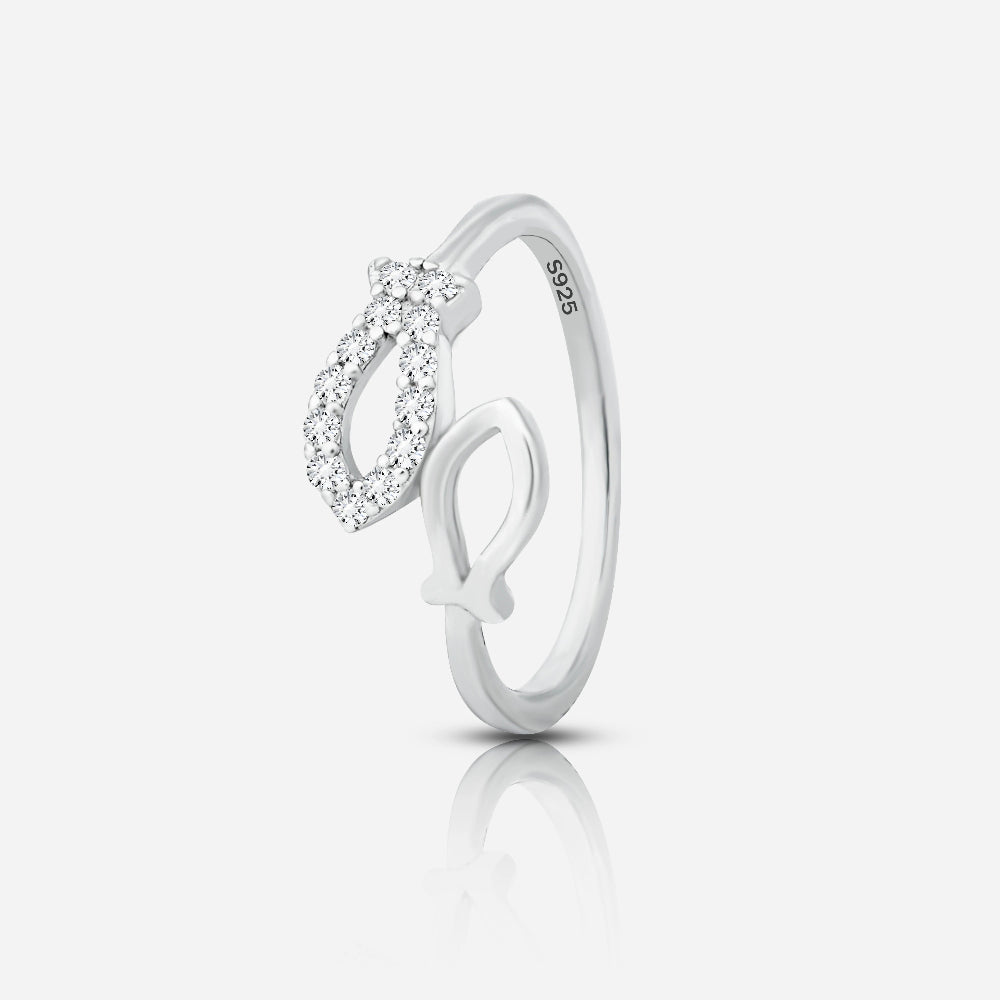 Silver ring with diamond accents on a white background