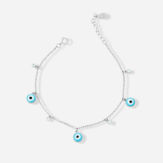 Silver bracelet with turquoise evil eye charms on a white background